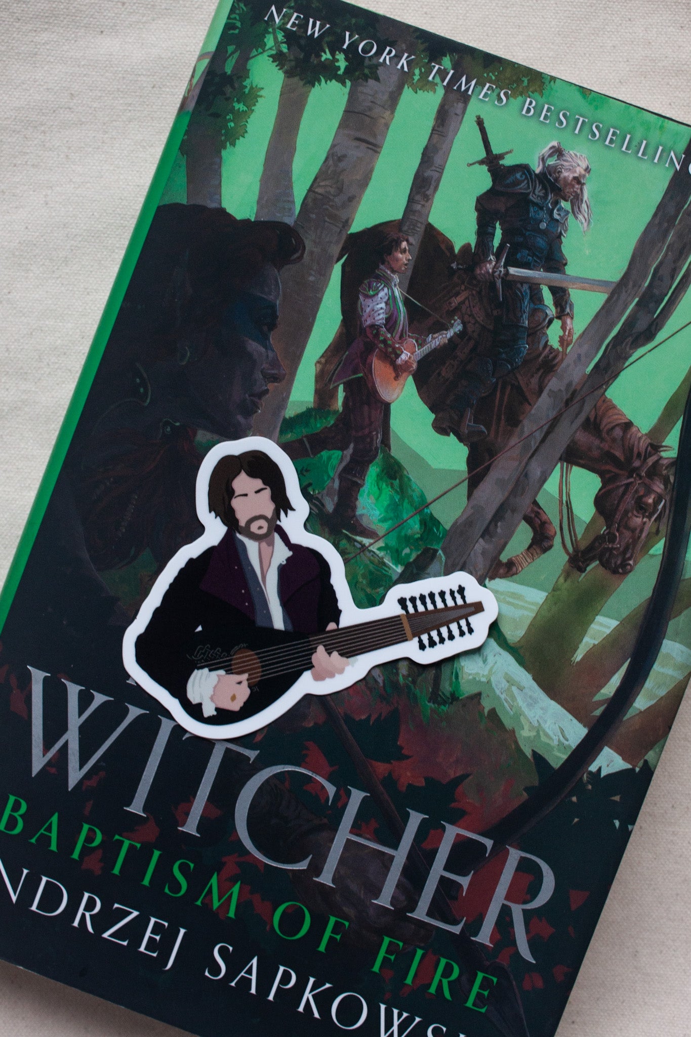 Dandelion the bard Witcher sticker, depicting the charming musician with his lute and signature flamboyant clothing. A great gift for fans of The Witcher’s witty character.