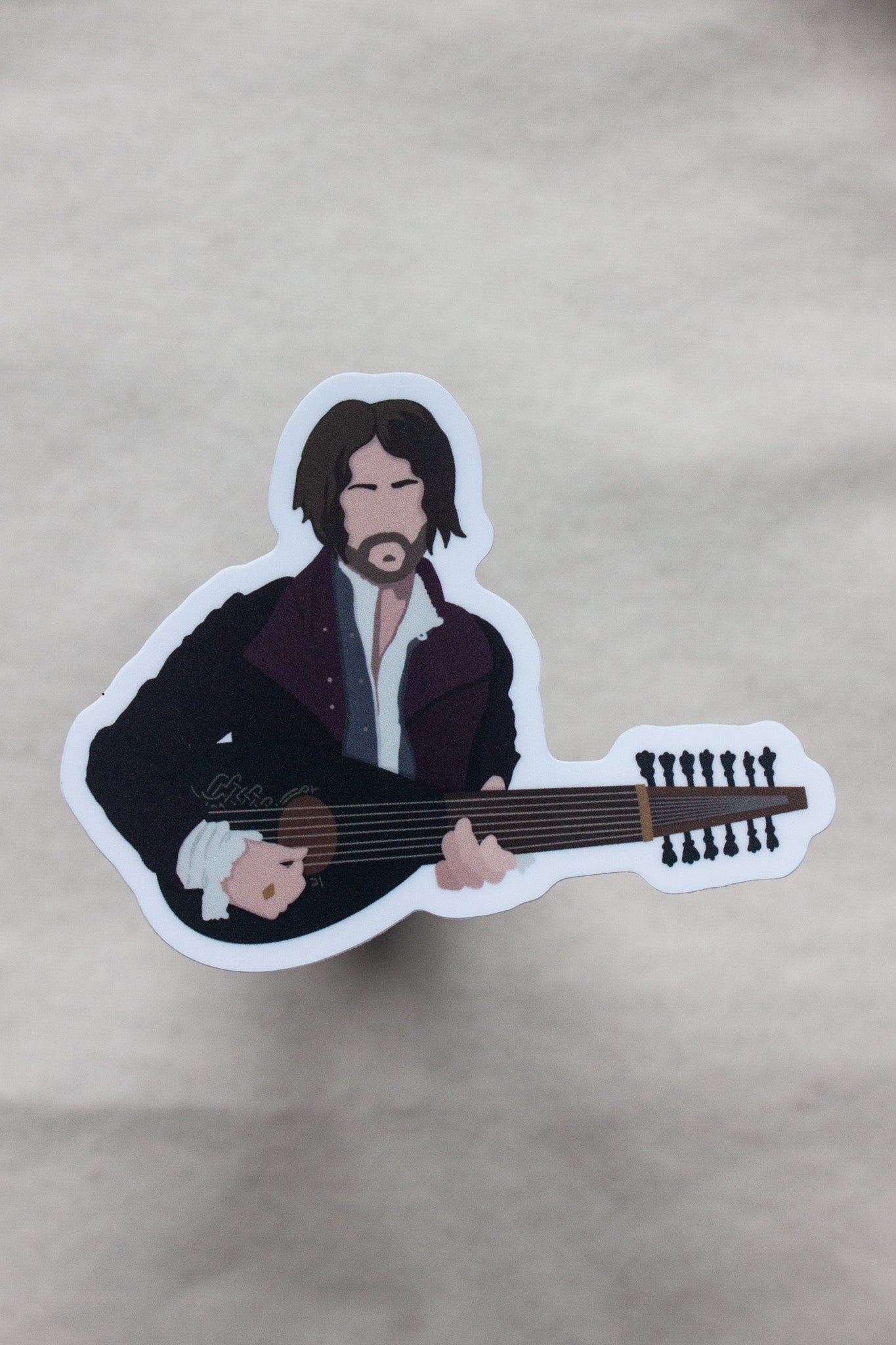 Dandelion the bard Witcher sticker, depicting the charming musician with his lute and signature flamboyant clothing. A great gift for fans of The Witcher’s witty character.