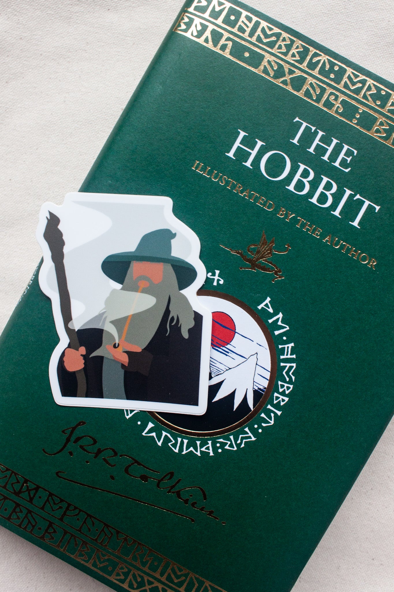 Gandalf the Grey sticker from The Lord of the Rings, depicting the iconic wizard with his staff and cloak, exuding wisdom and power. Perfect for fans of Gandalf and Tolkien’s saga.