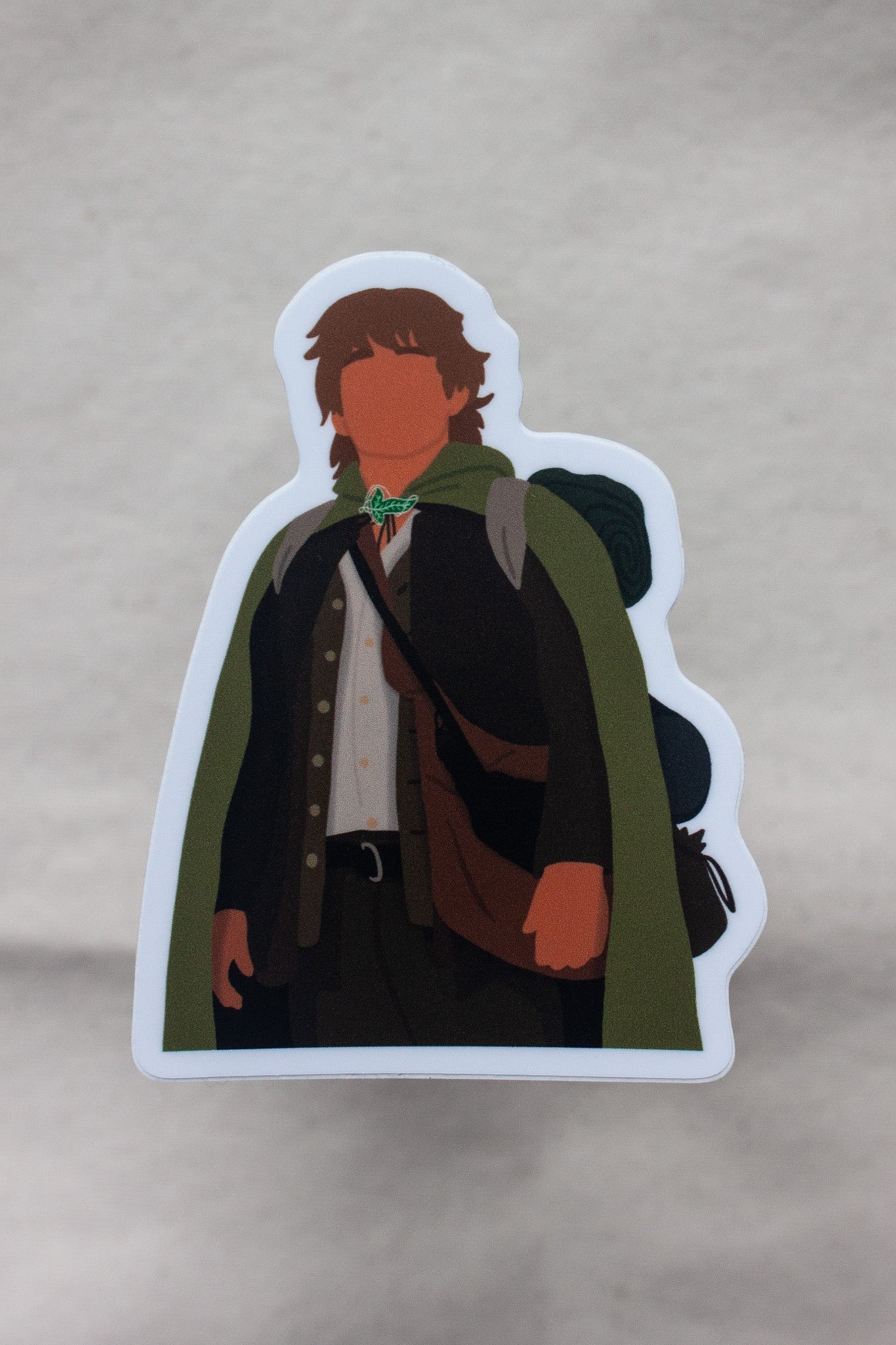 Samwise Gamgee sticker from The Lord of the Rings, showing the loyal hobbit carrying supplies and ready to protect Frodo. A must-have for fans of Sam’s heart and heroism.